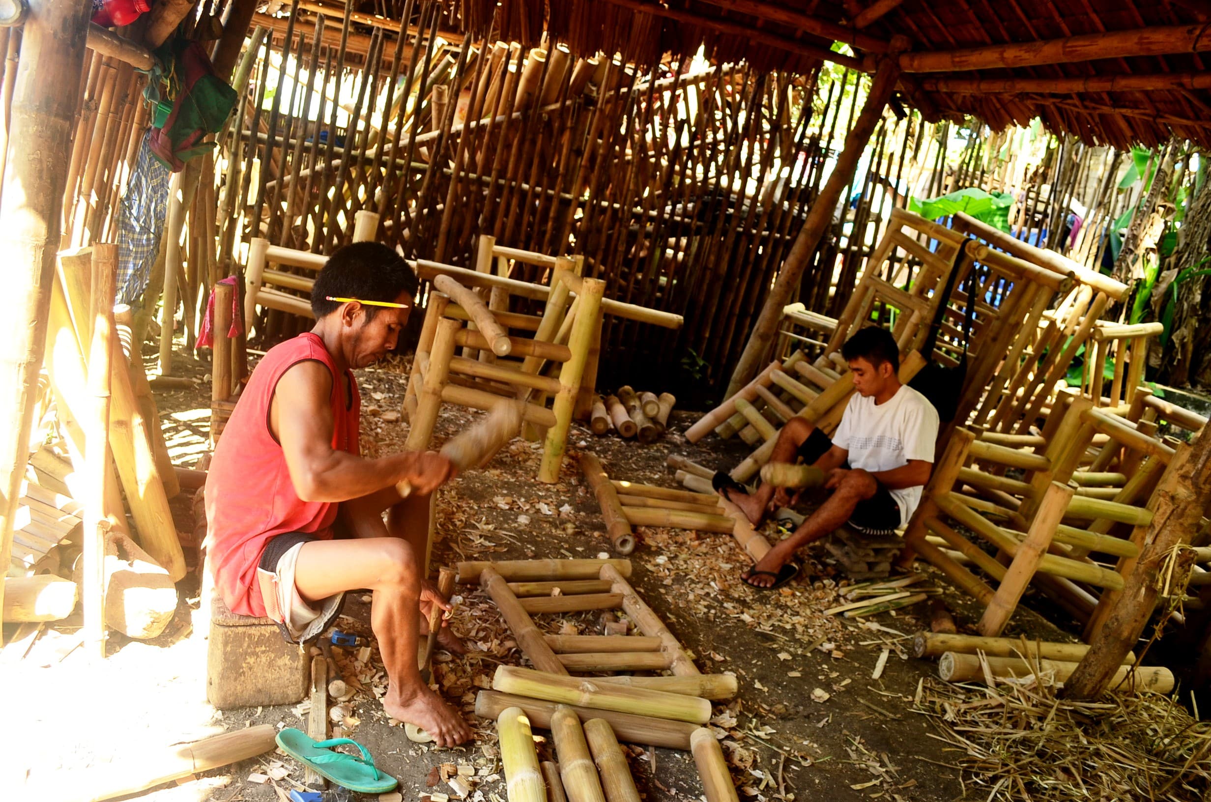 An image depicting the local artisans manufacturing bamboo products