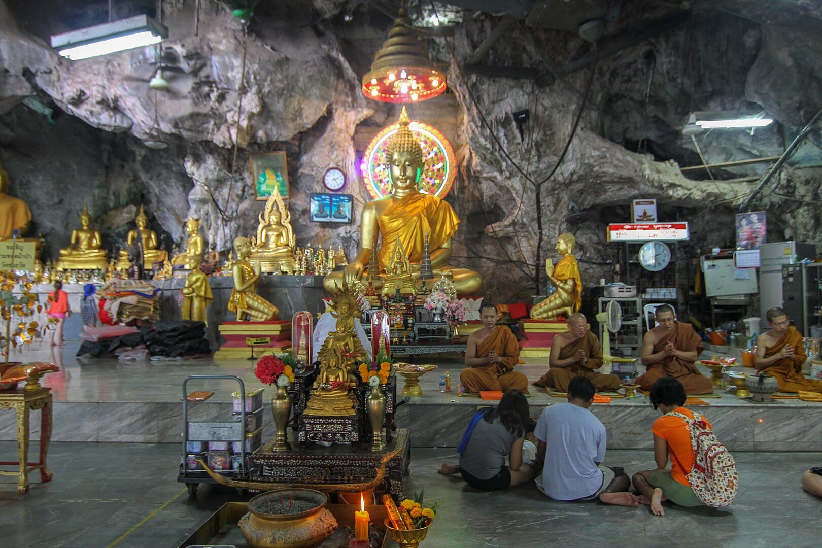 Monks conducting prayers inside the temple