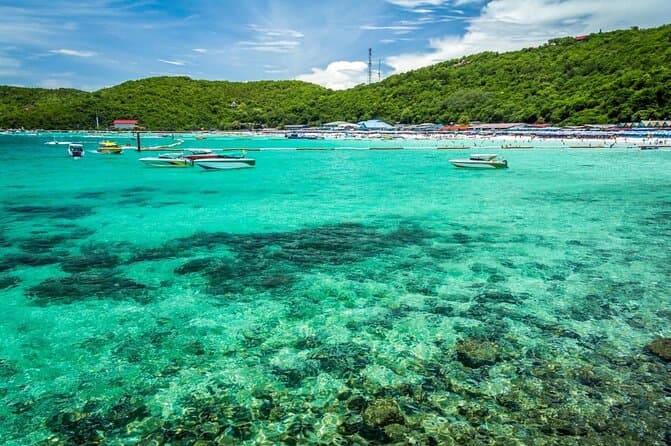 Crystal clear blue waters Coral Island