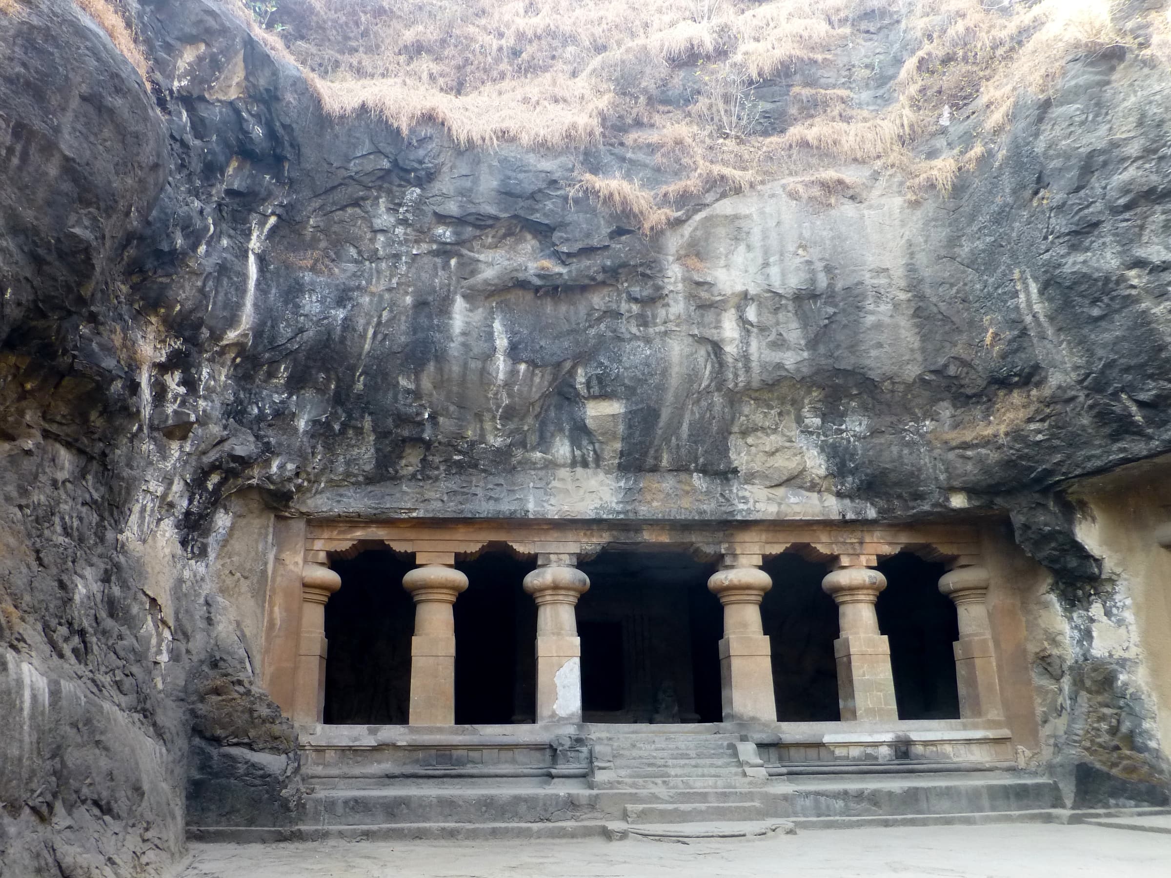 Outside view of pillars Elephanta Caves