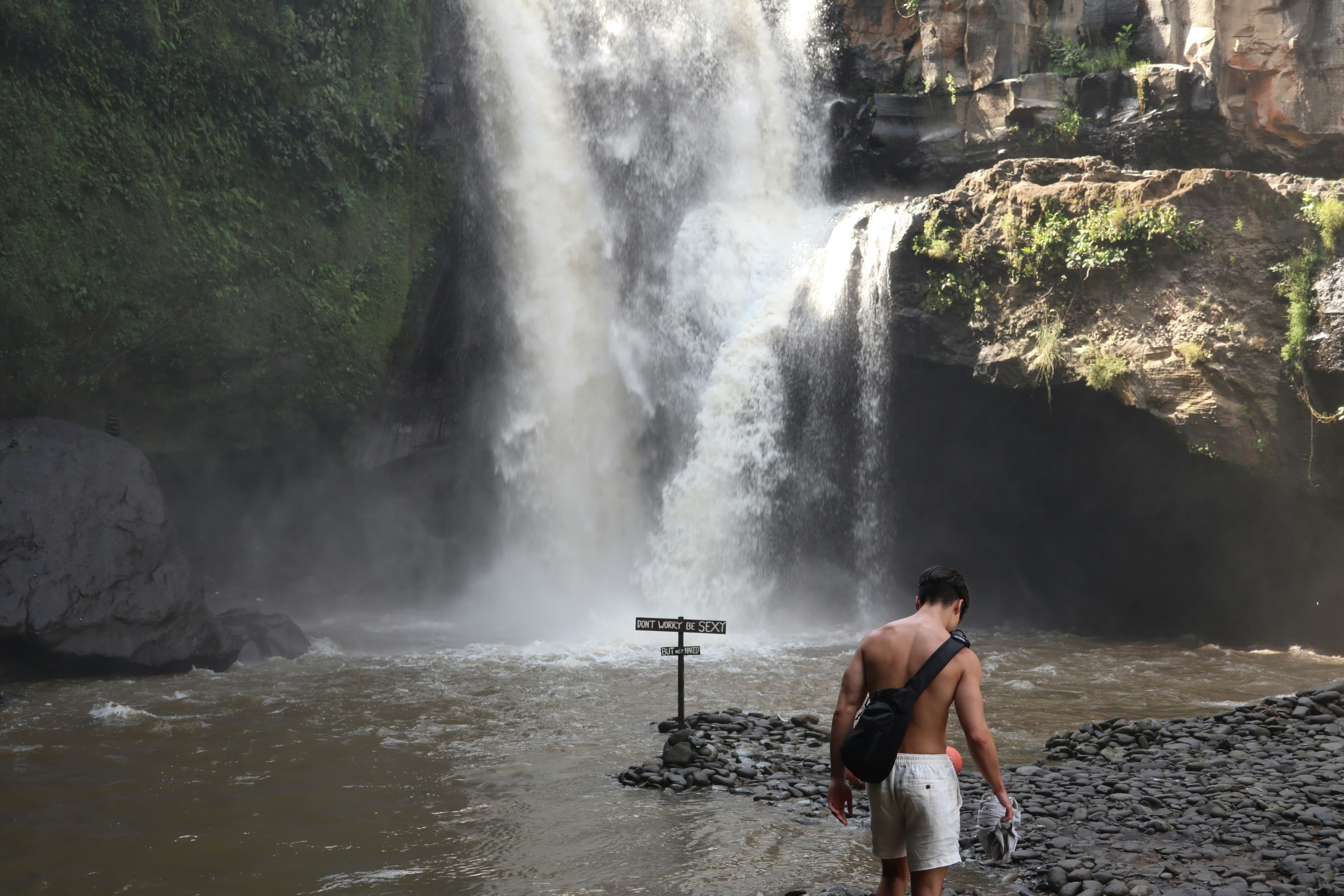 Tegenungan Waterfall cascading down the rocks