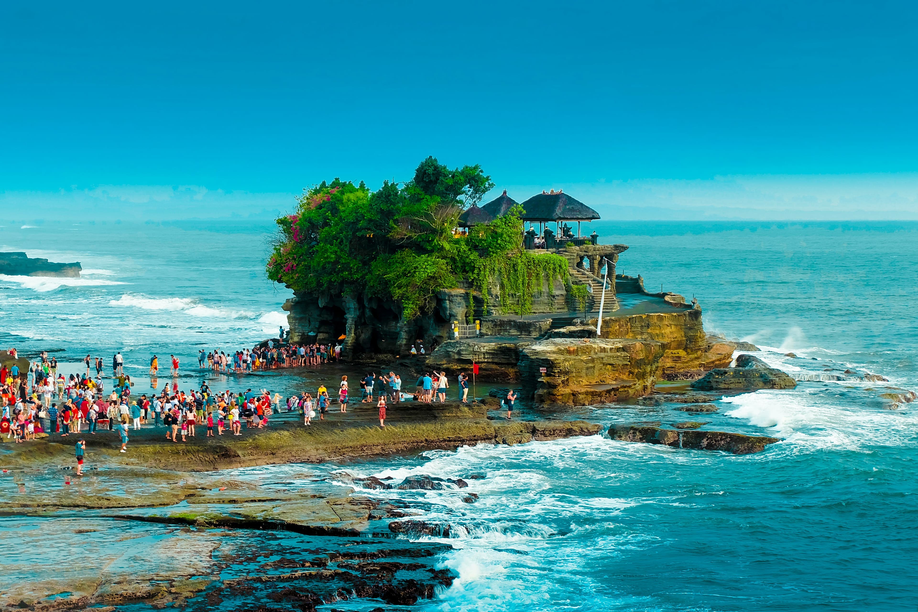 Tanah Lot Temple perched on rocky sea outcrop