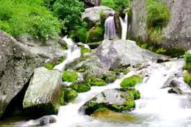 Jogini Waterfall cascading down rocks