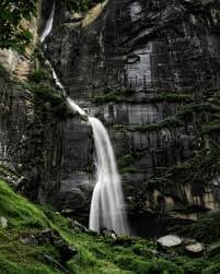 Tall Jogini Waterfall with misty surroundings