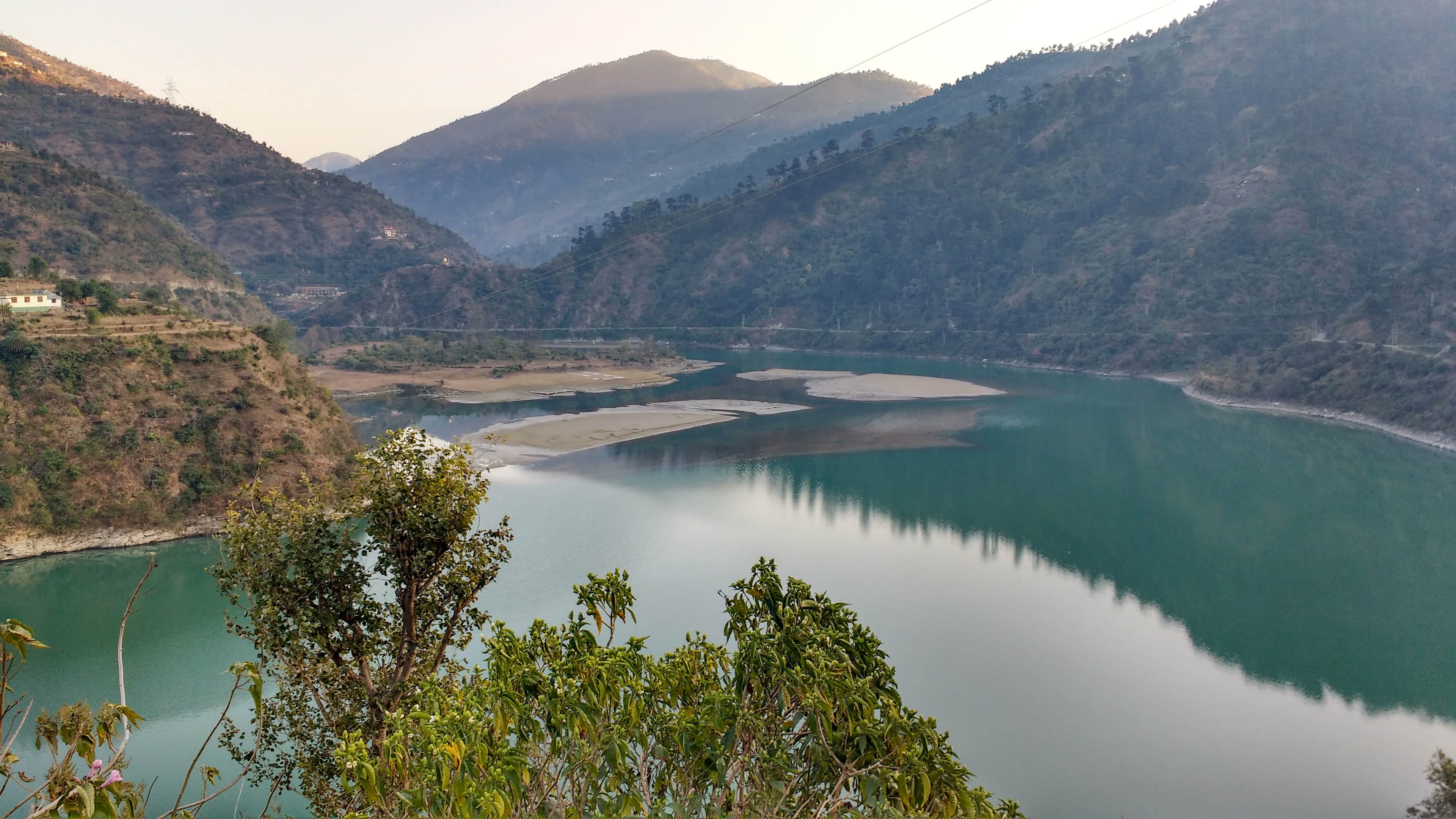 Pandoh Dam integrated into the mountainous landscape