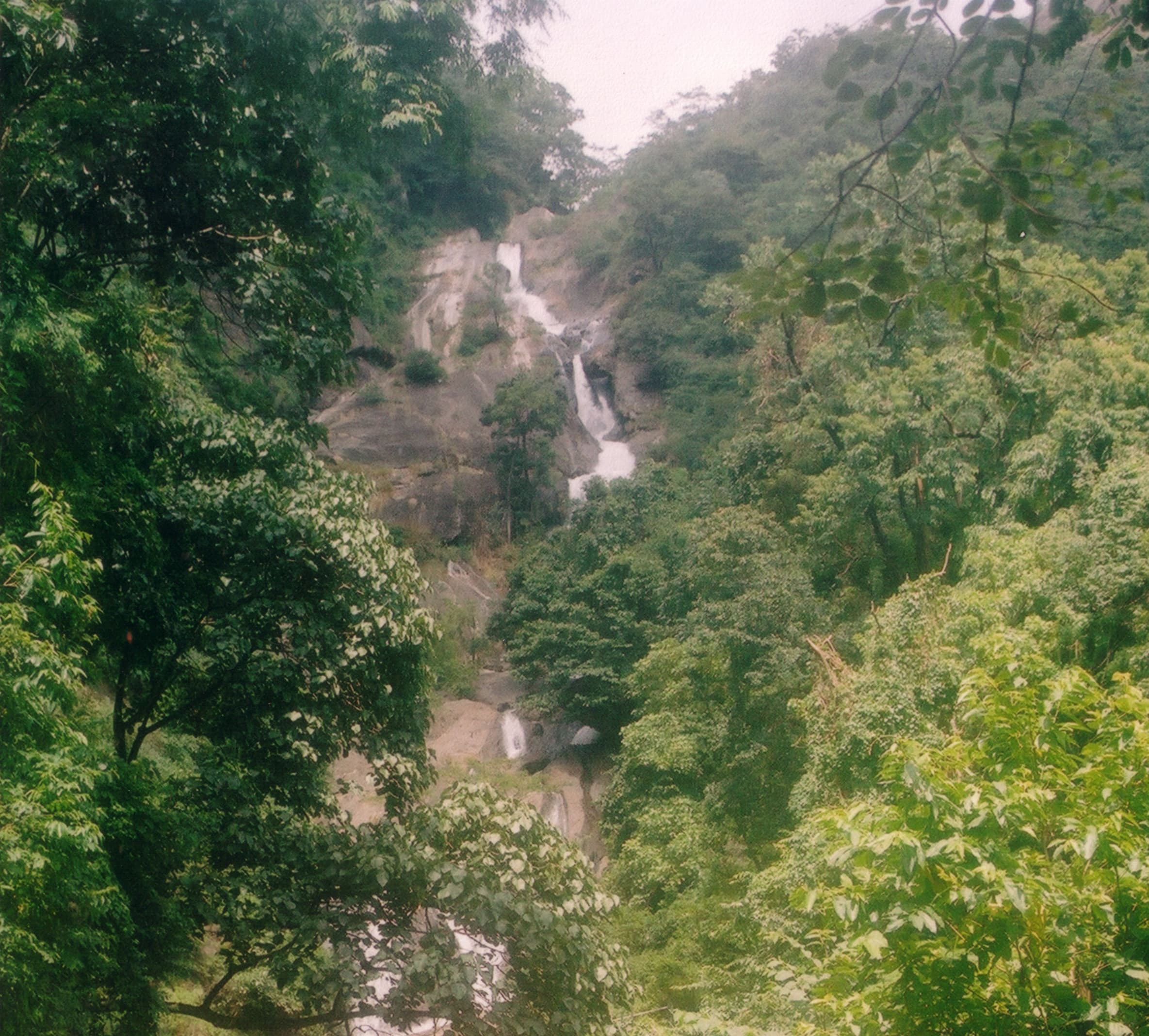 Distance view of Siruvani Waterfalls