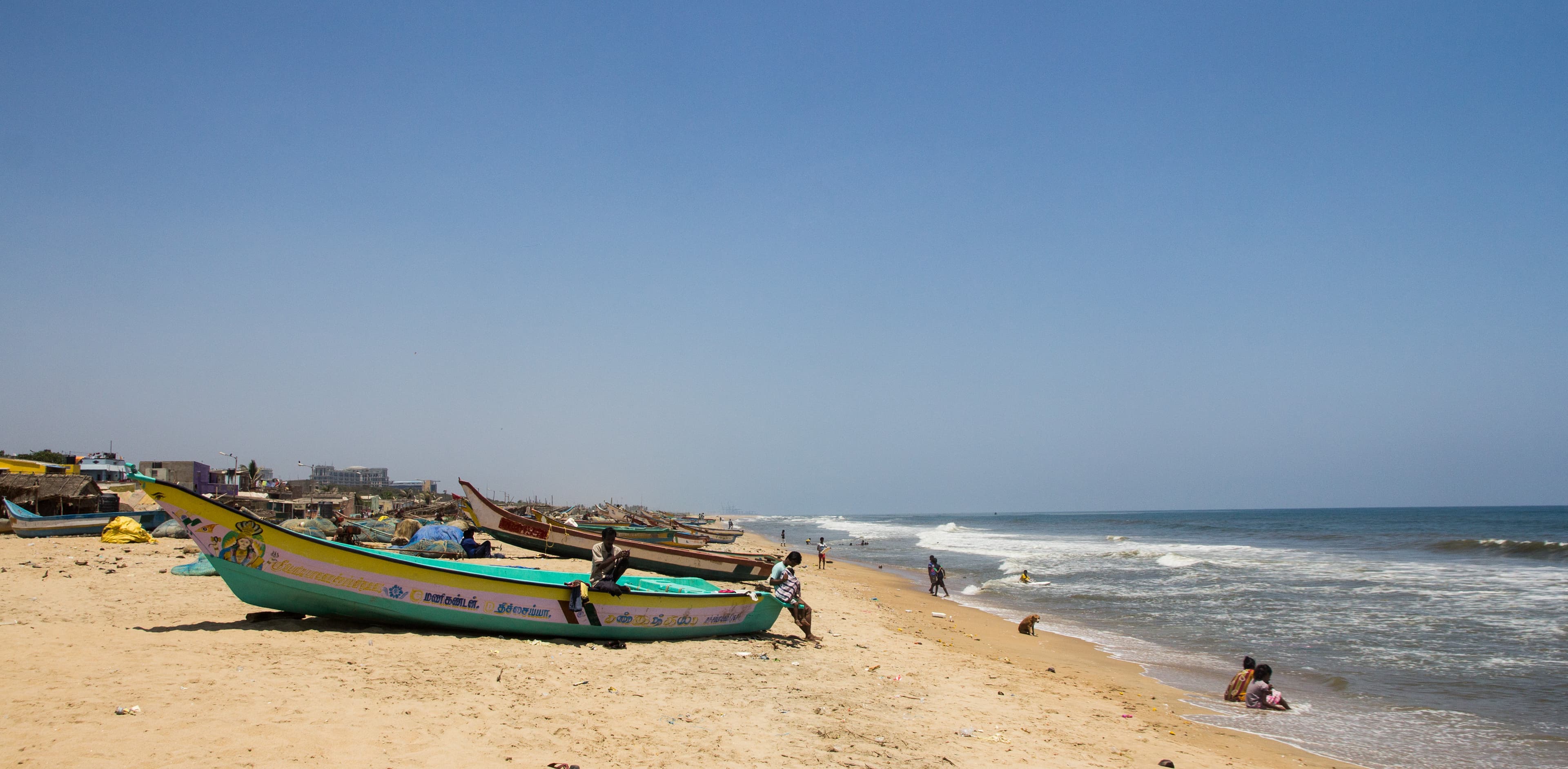 Fishers and their boat in Elliot's Beach