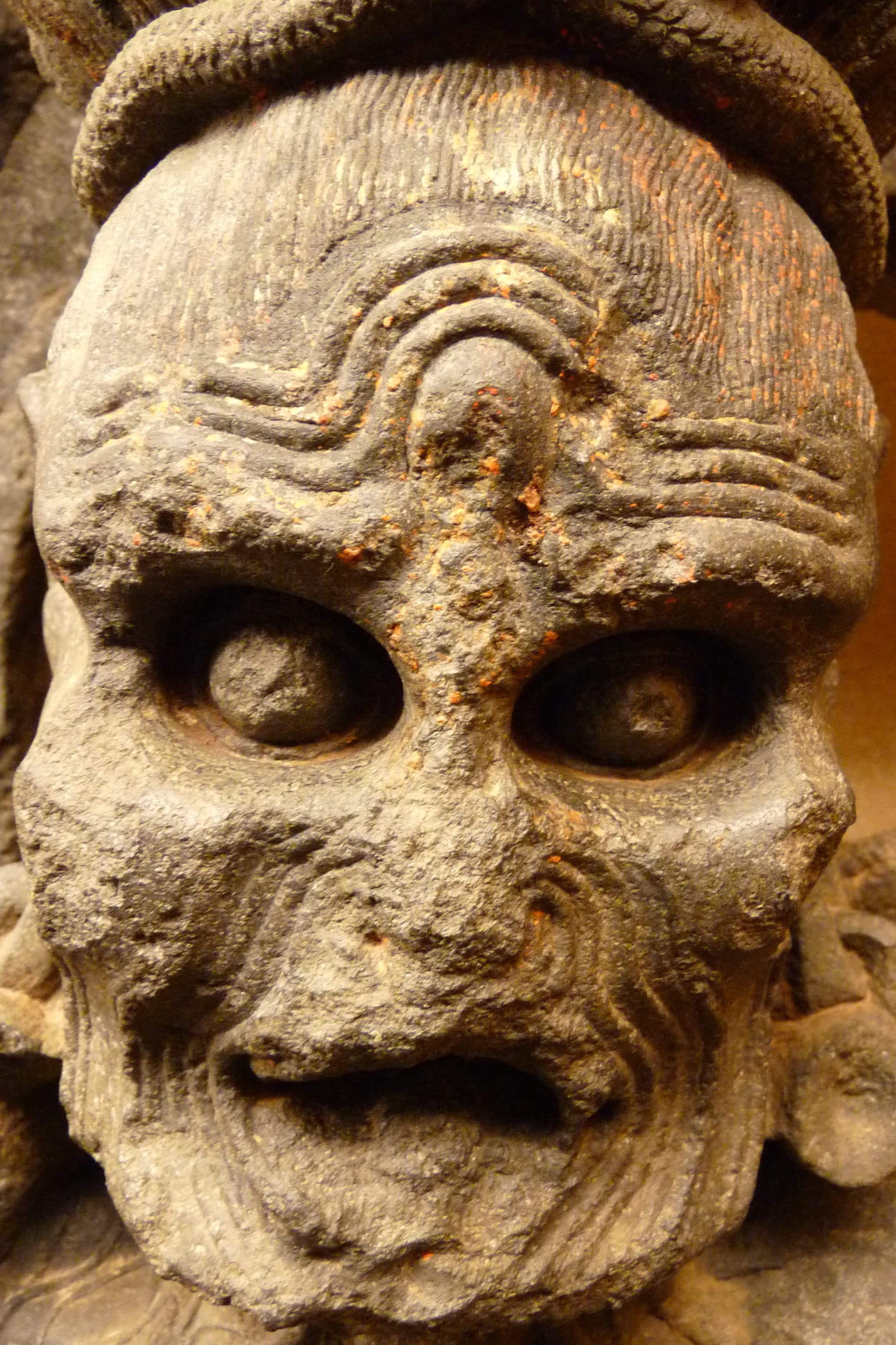 Scary stone carving masks in Odisha State Museum