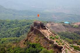 Visitors exploring the ruins of Pratapgad Fort