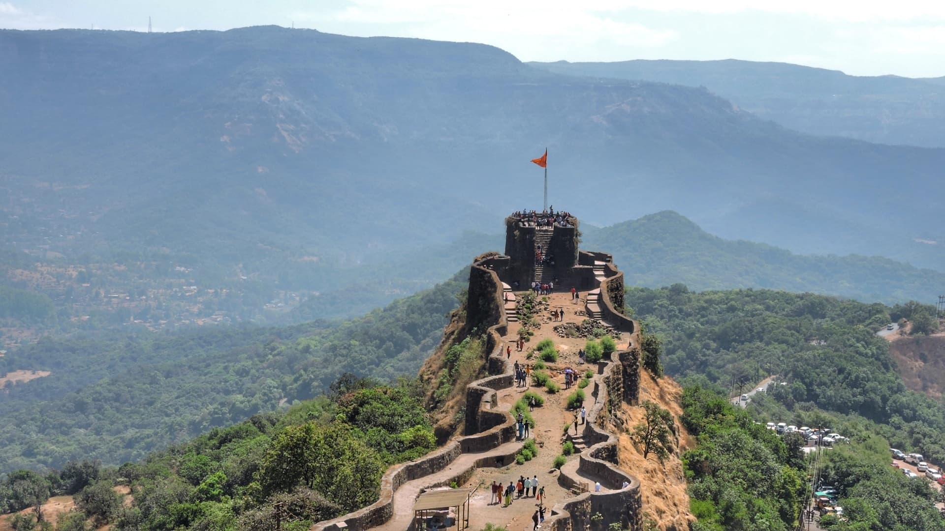 View from Pratapgad Fort overlooking lush green hills