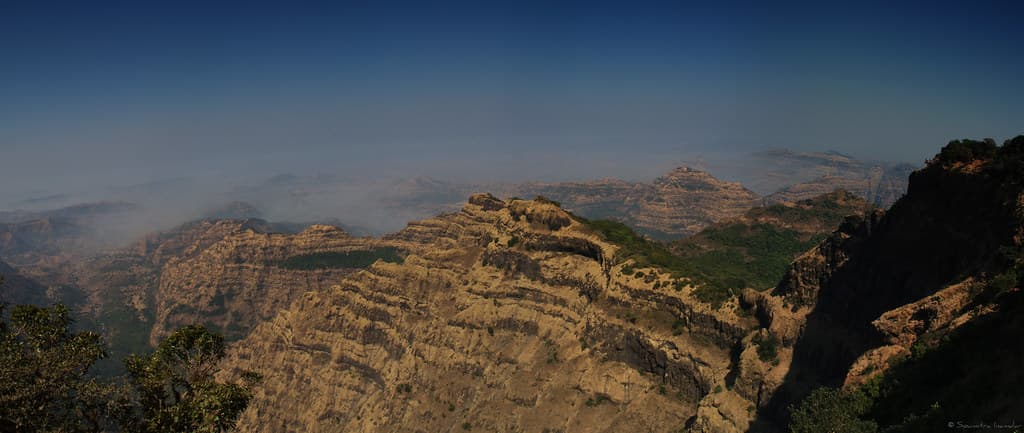 Scenic vista from Arthur Seat, lush green hills visible