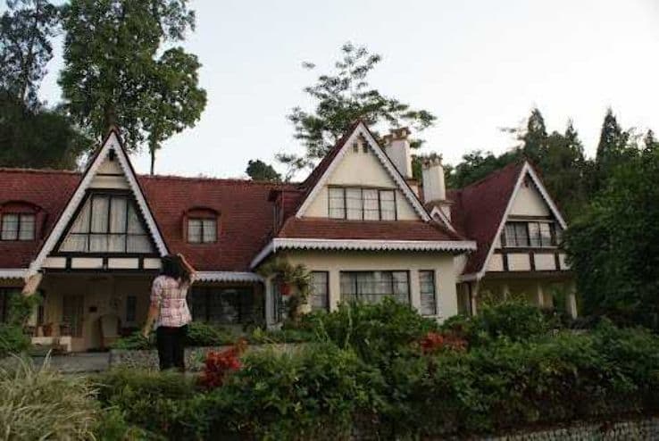 Cloudy day view of Crookety House