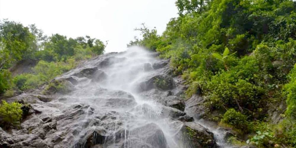 Flow of water on a rocky terrain in Katiki Waterfalls