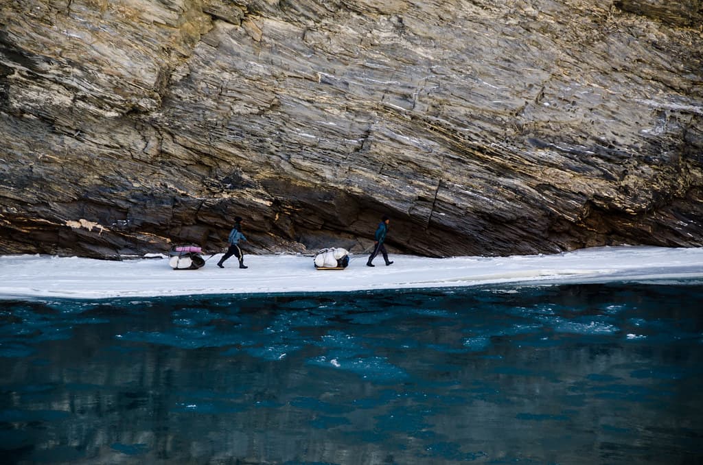 Frozen trail leading trekkers on Chadar Trek