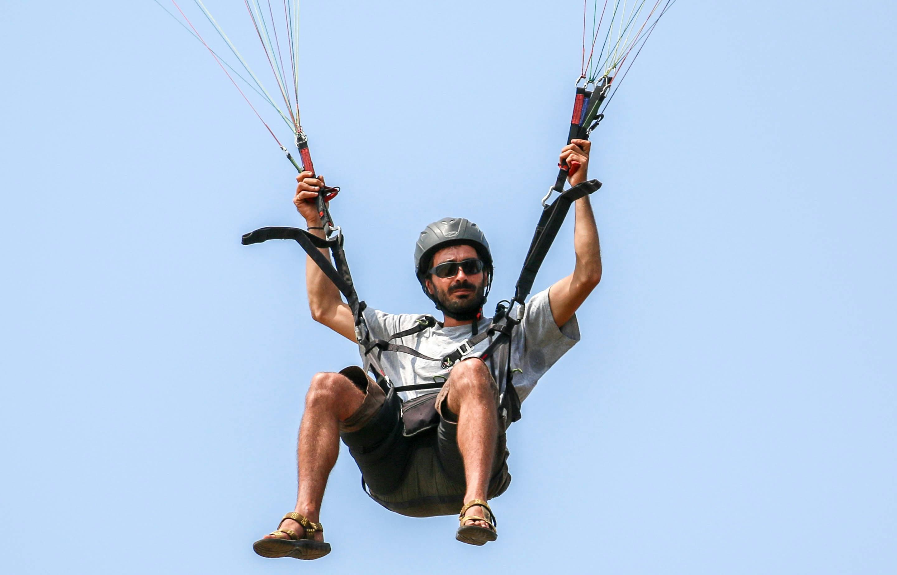 Paragliders enjoying the cool breeze over Anjuna Beach