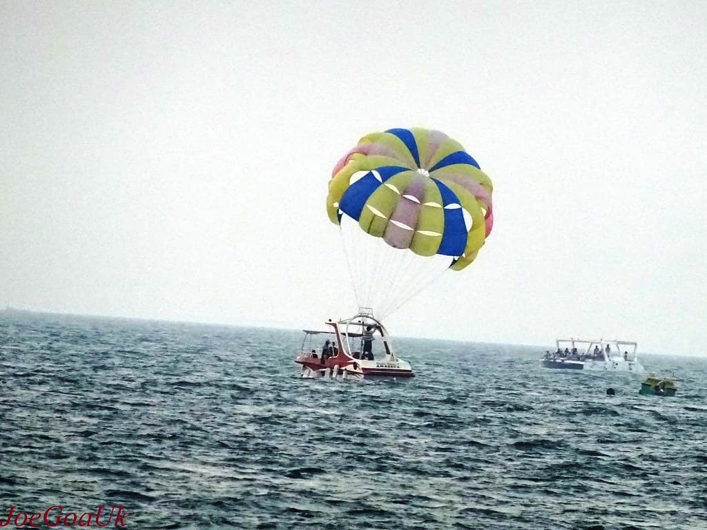 Adventure enthusiasts gearing up for parasailing at Calangute