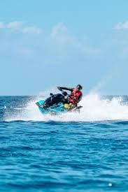 Participants enjoying jet ski water sports at Baga Beach