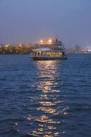 Mandovi River bustling with cruise boats.