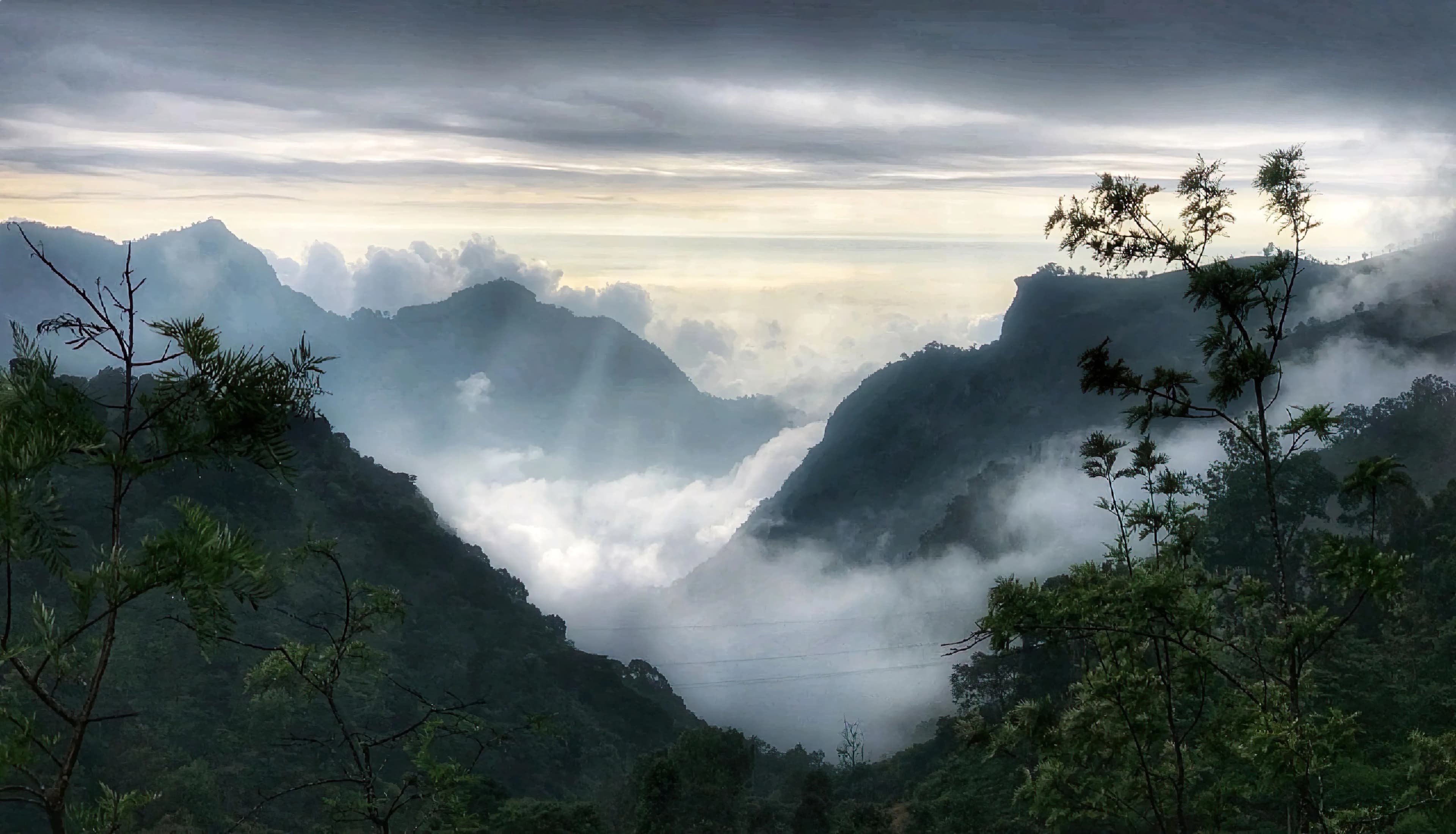 Kotagiri Trel: Blissful Sunlight Filtering Through Clouds on Trek