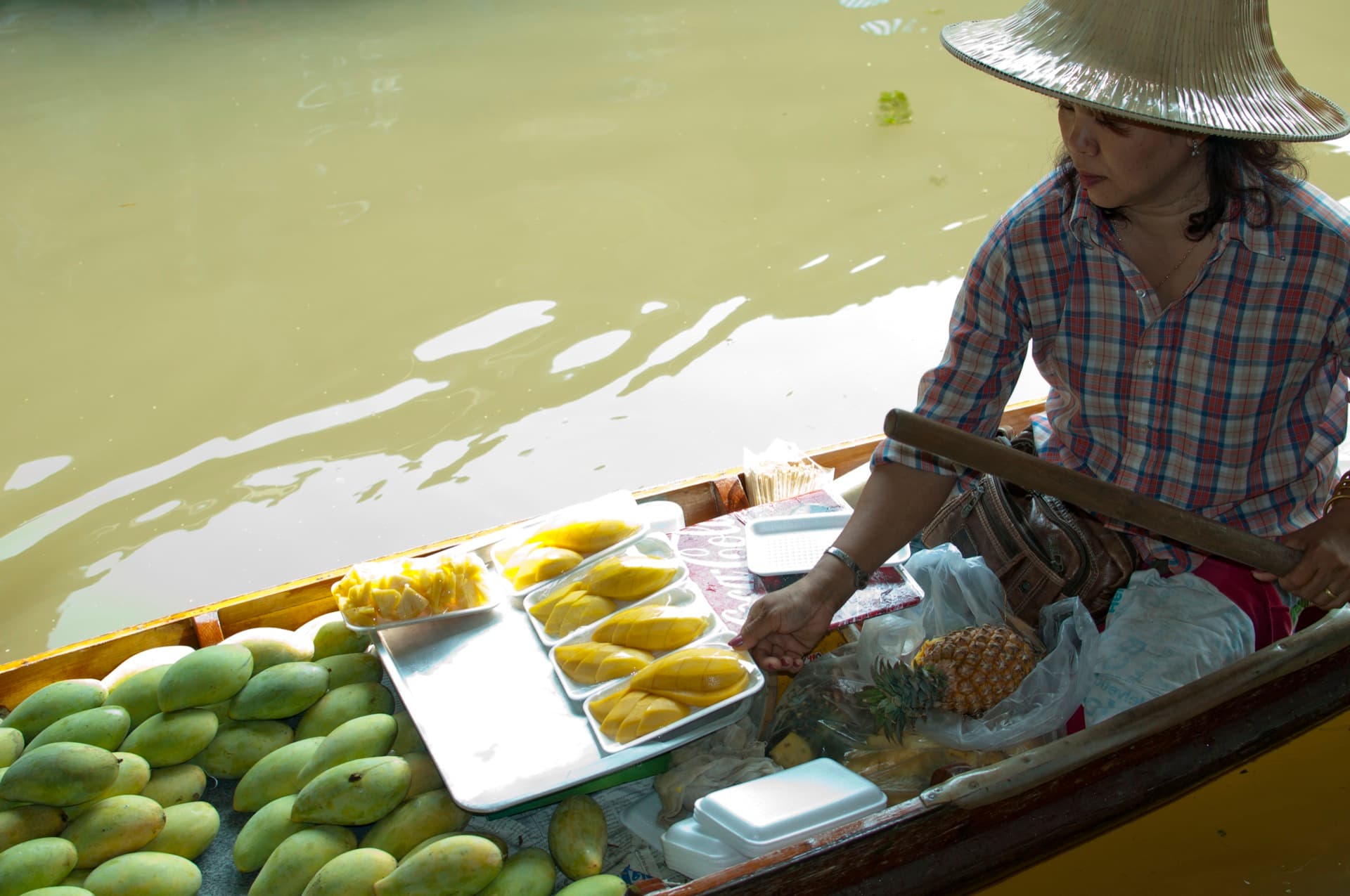 Woman selling Mangoes
