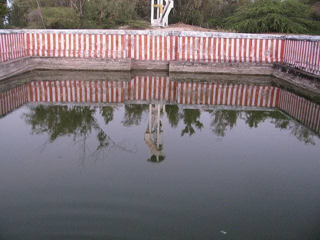 Clear water in Jada Theertham temple pond