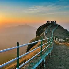 Lodwick Point: Expansive green valleys and misty peaks