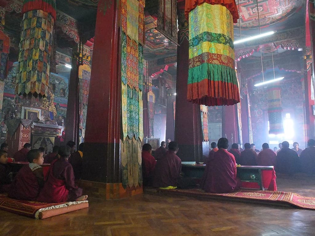 Prayer hall in Tharpa Choling Monastery