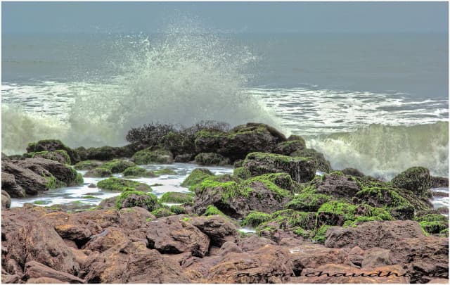 Roack and water rushing in Yarada Beach