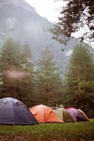 Camping tents with Nandi Hills landscape