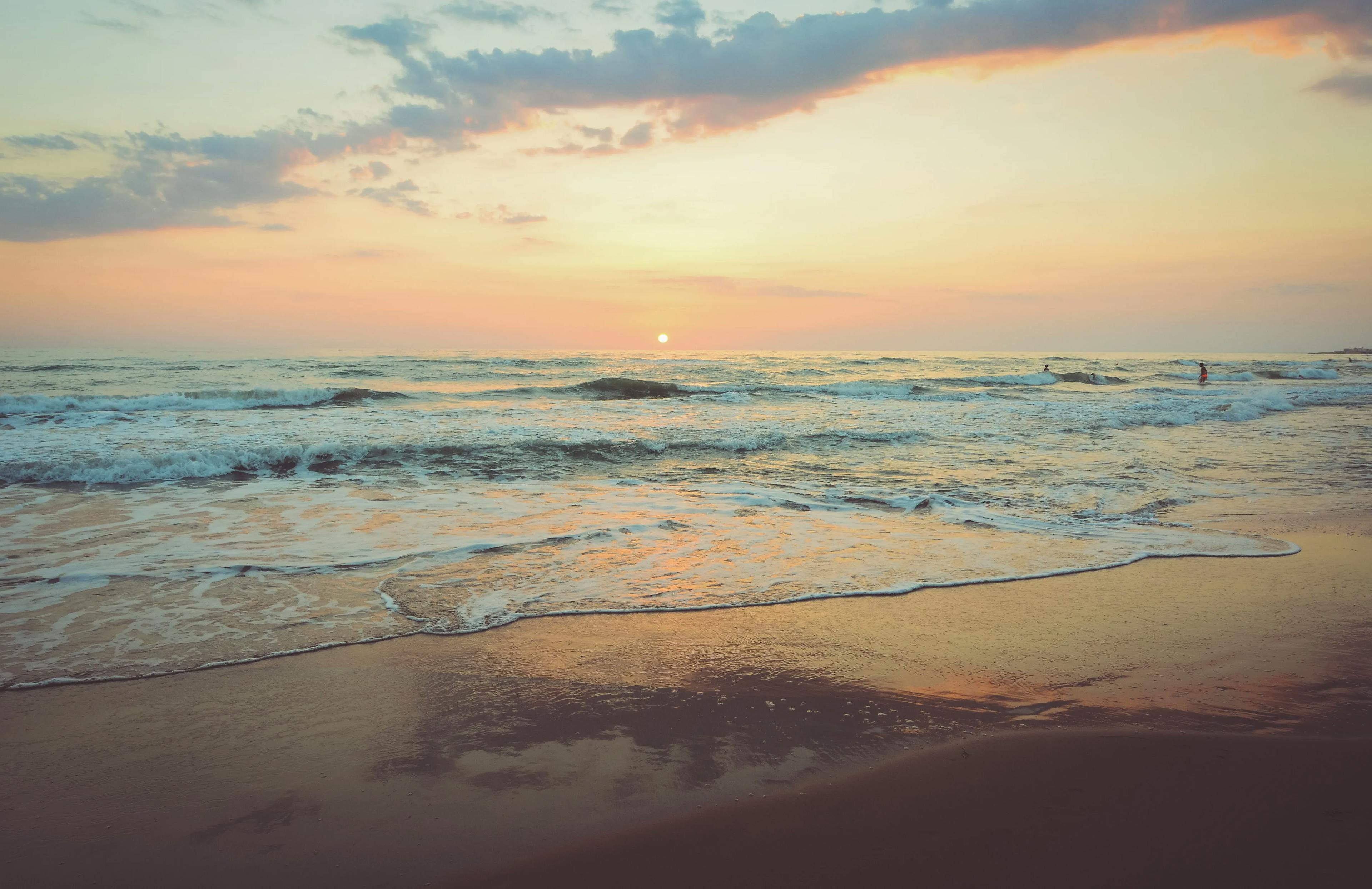 Karwar Beach Trek: Waves in Golden Hour Splendor Sunset