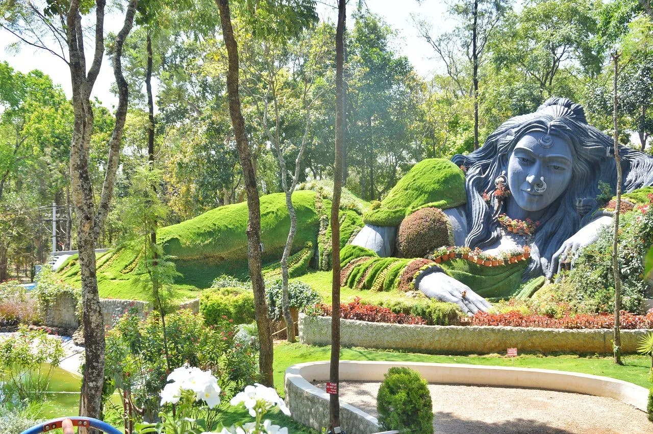 Chikmagalur Weekend Getaway: Tranquil Beauty of Women Sculpture Amidst Greenery