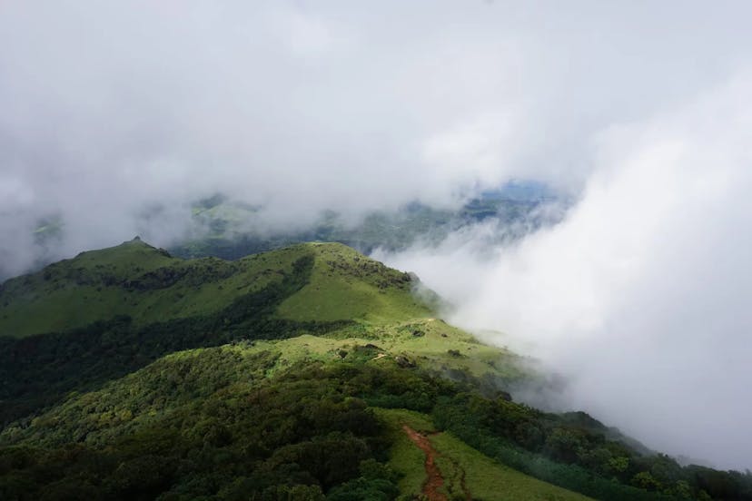 Tadiandamol Trek:  Blissful Top Mountain View with Misty Clouds