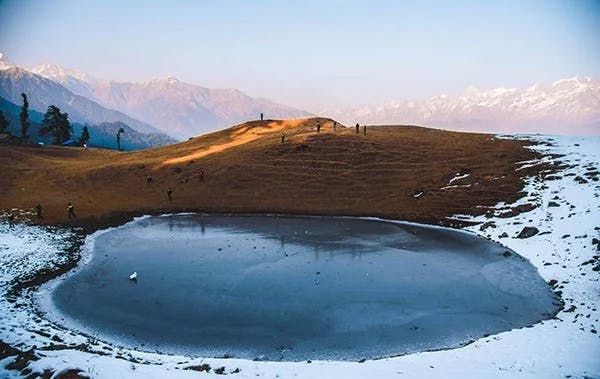 Dayara Bugyal Trekking Adventure: Alpine Pond and Snowy Peaks