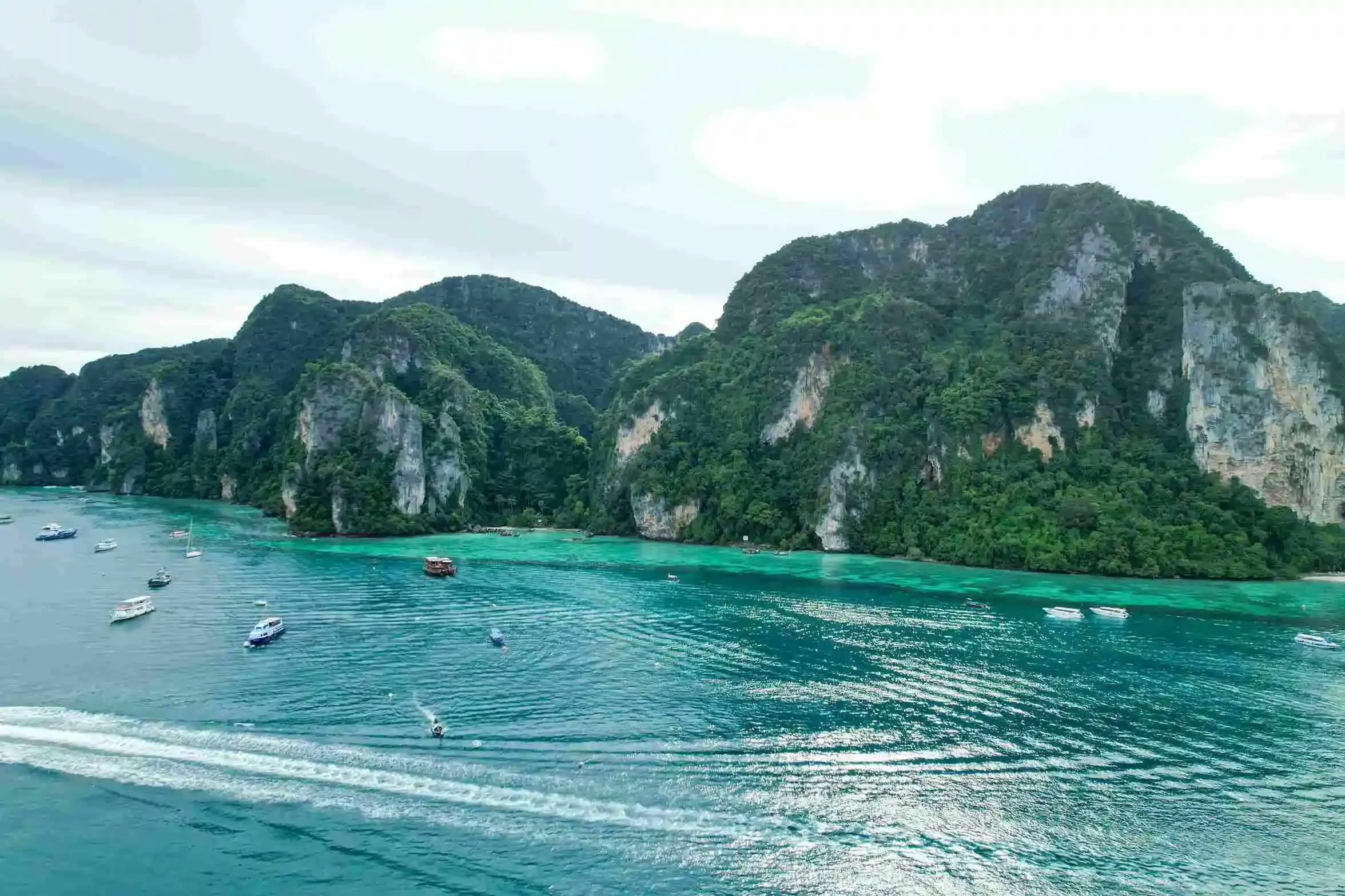 Island Paradise: Captivating View of Phuket Phi Phi's Blue Waters and White Sands from Bangalore